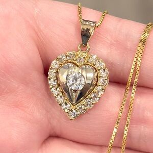 Elegant Gold and Silver Heart Pendant Necklace